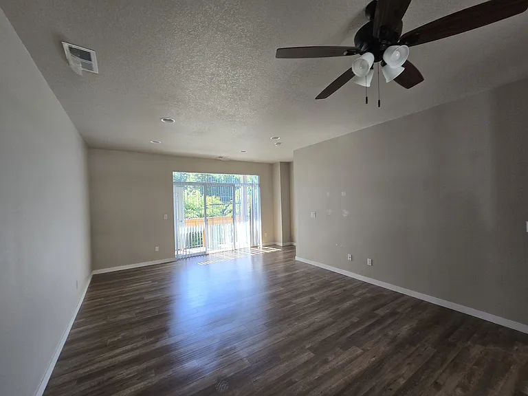 Great Room - looks out onto deck and linden tree