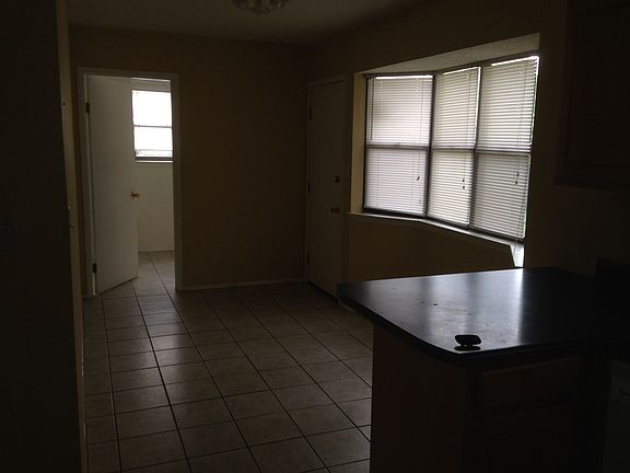 Breakfast area from kitchen. Laundry room is behind door