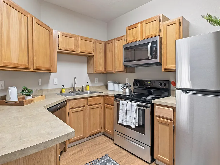 Indulge in the epitome of culinary comfort. Our classic-style kitchen beckons with ample storage and modern stainless-steel appliances.