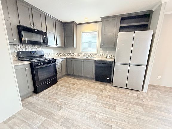4th image of 534 E 37th Ave Lot 650
