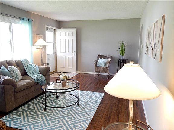 Inviting living room with original hardwood