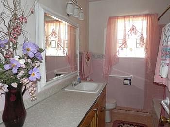 Full bath on main floor & 1/2 bath in basement