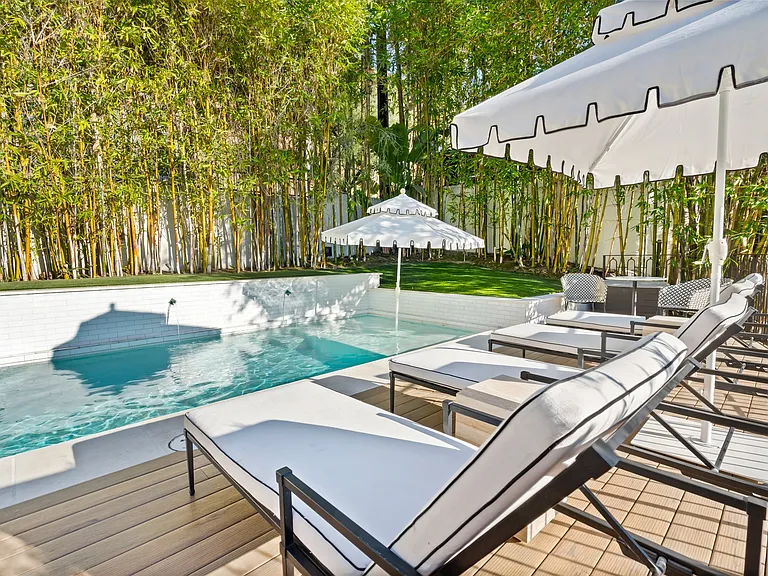Lounge in style with adjustable sunbeds and resort-inspired details.