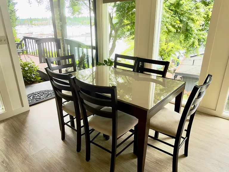 dining area with floor to ceiling windows