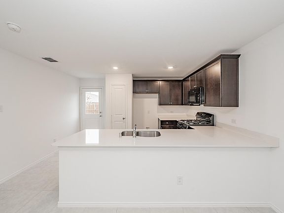 5th image of 7509 Larson Ln