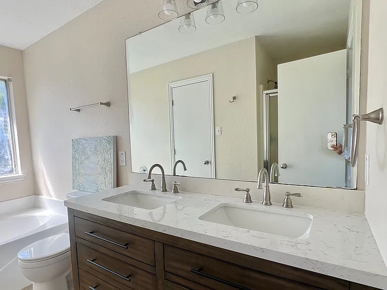 Primary bath with new vanity and lighting