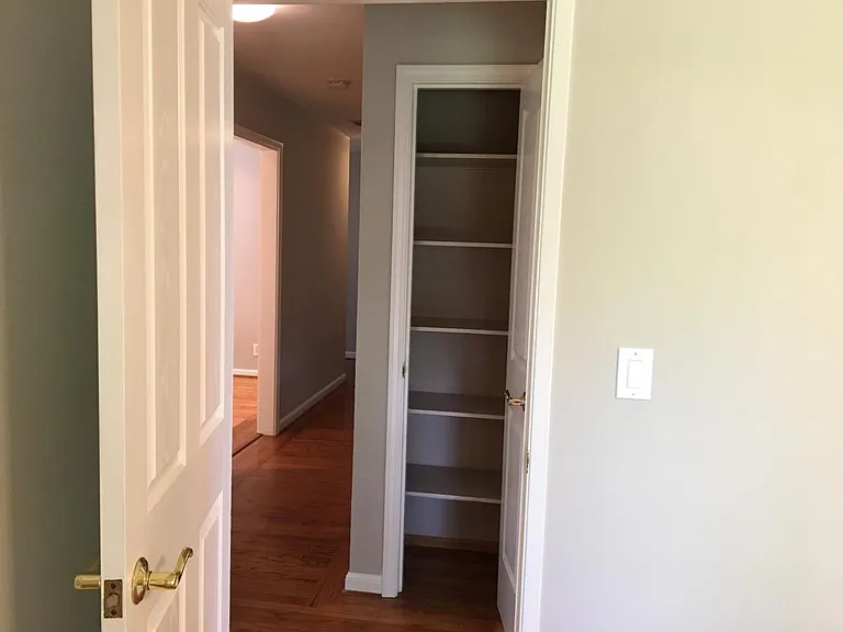 Linen closet and hallway outside Master.