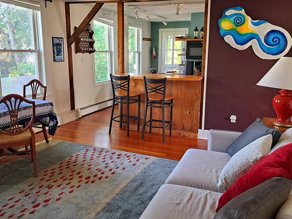 There is a dining bar as well as a dining table.