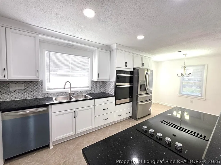 216 Country Club Dr — Photo 15