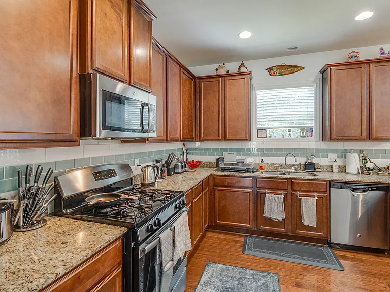 Spacious kitchen with granite counter tops