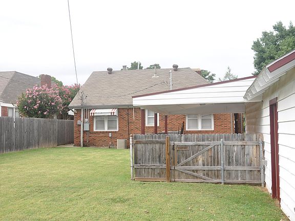 The large back yard is great for a dog, a child, a garden, or a party.