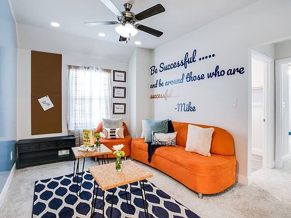 Upstairs living area with dry erase wall.