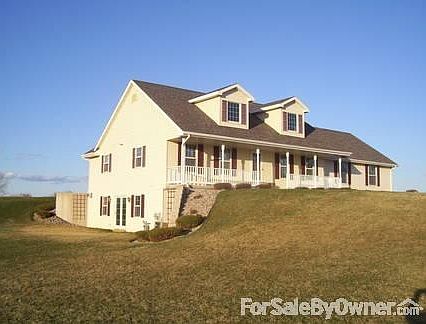 Side view
						:
						French doors from lower level to outside. Fire pit outside perfect for parties.