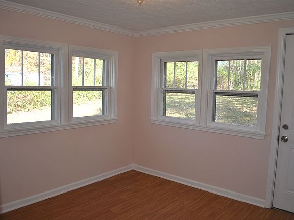 Dining area, den opens to back yard