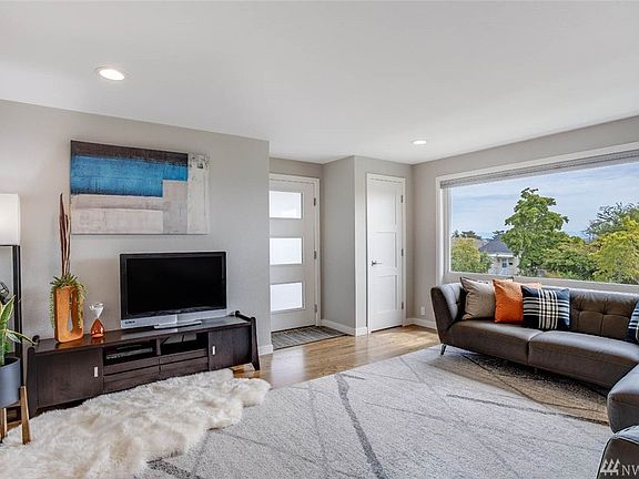 The large picture window lends lots of natural light through the home and frames the mountain views. Perfectly placed guest closet off the main entrance keeps the area tidy and has been updated as has the entire door package throughout the home. 