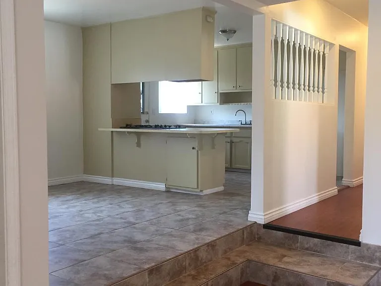 View of kitchen and dining area from living room