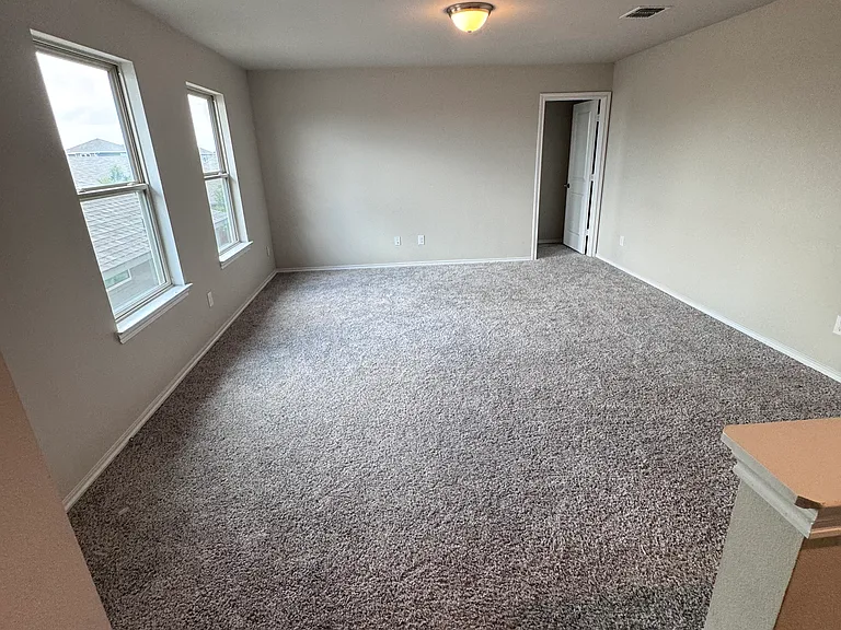 Spacious upstairs game room, flex room.