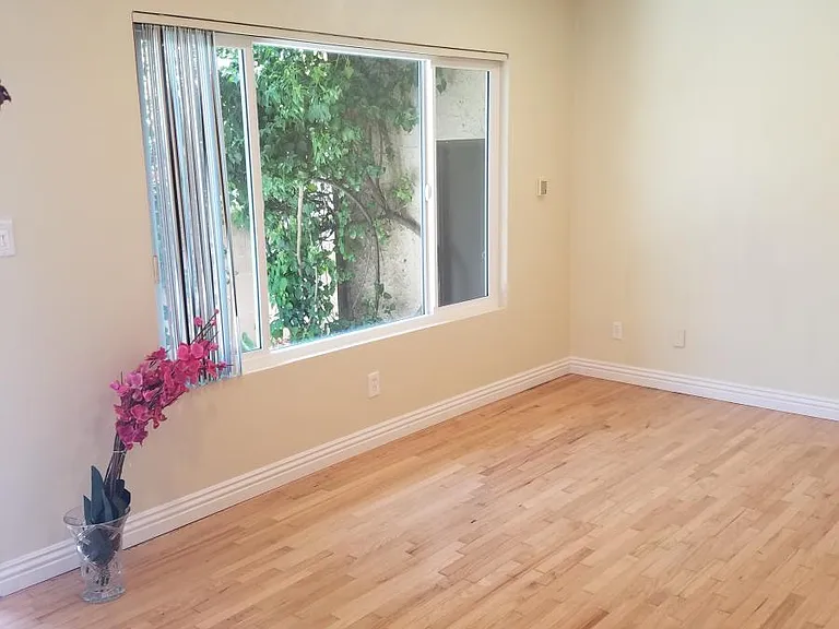 Beautiful Hardwood floors and new windows and recessed light