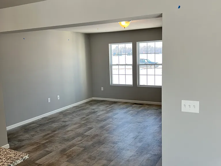 Looking at the family room from the kitchen/dining area.