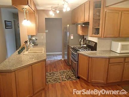 Fully remodeled kitchen
						:
						All new cabinets, countertops, tile work, flooring, dual fuel range, lighting