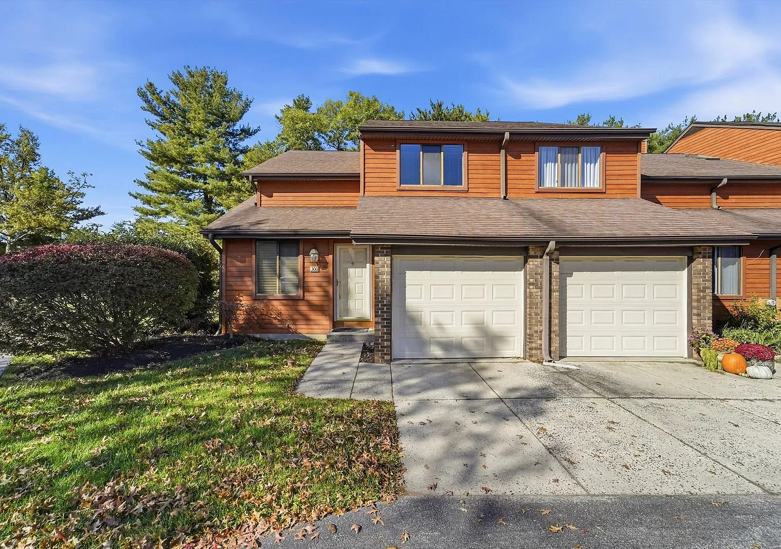 Beautifully Renovated End-Unit Townhome with Finished Basement, Deck & Garage | 300 Winding Way — Photo 1
