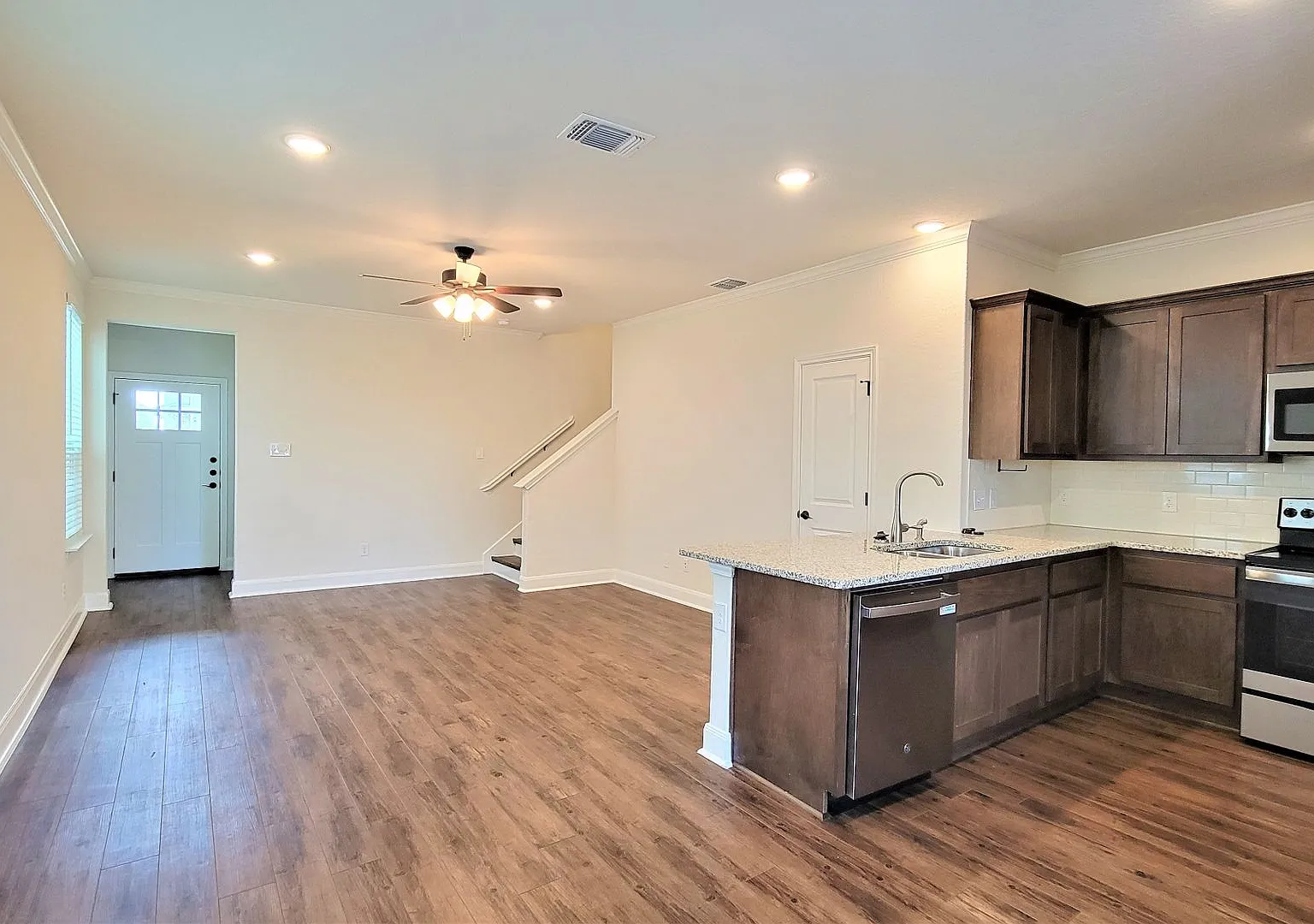 Gated Gramercy Village Townhome | 3BR/2.5BA | No Carpet — Photo 4