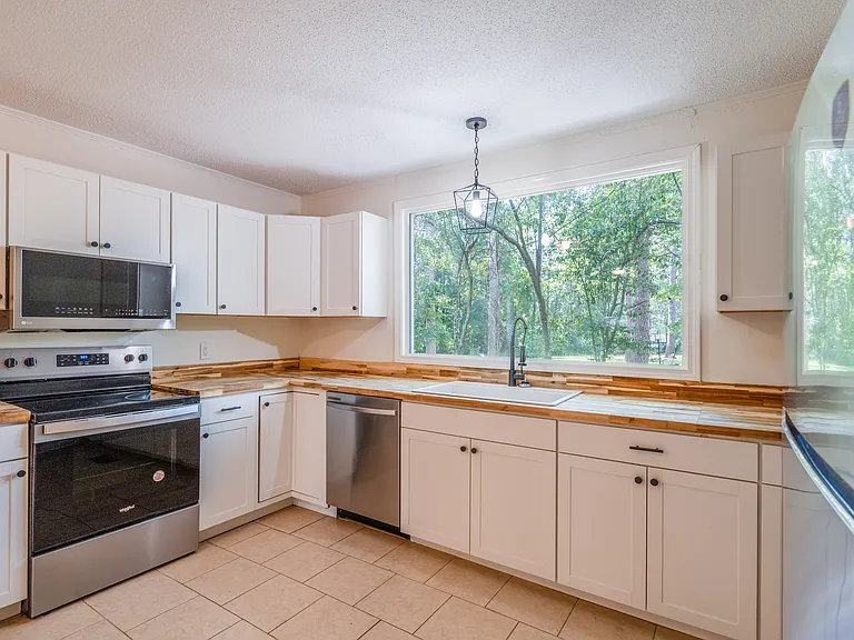 706 E Pinetree Blvd — Photo 58