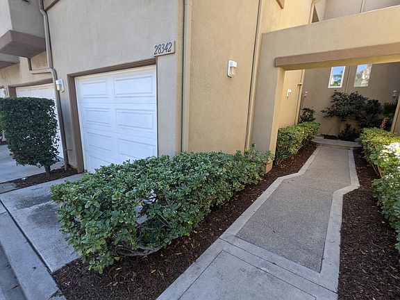 Garage and sidewalk to front door