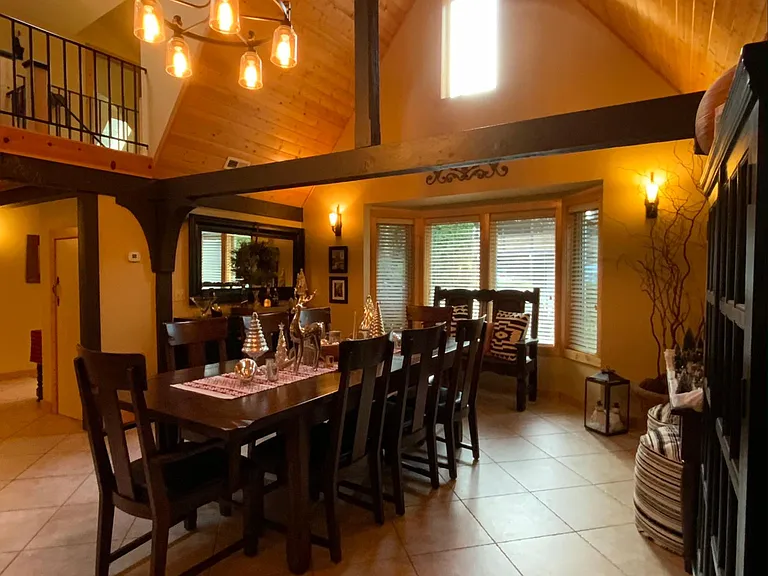 The bay window and upper window along with the skylights allow for more natural light.