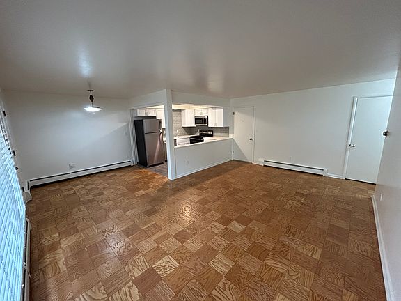 Living room looking toward kitchen