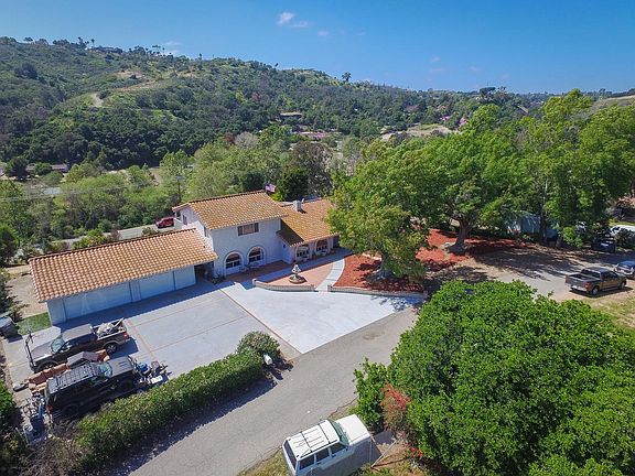 This gorgeous home sits on a huge, private lot with upgrades galore!