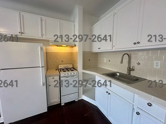 4th image of 1220 S Harvard Blvd #208