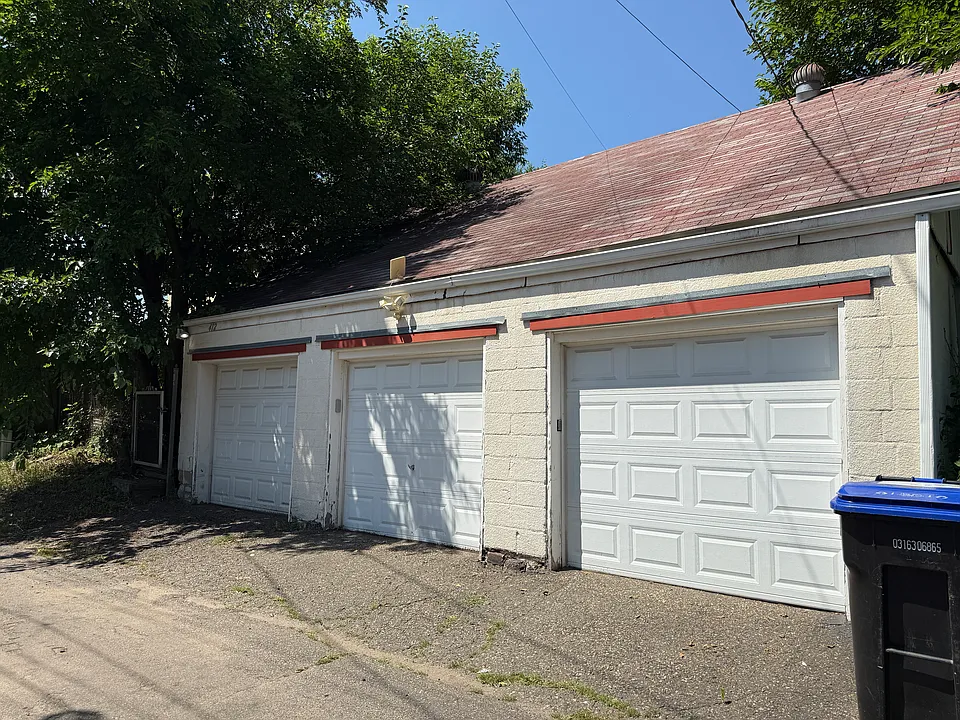 3 private garage stalls with openers