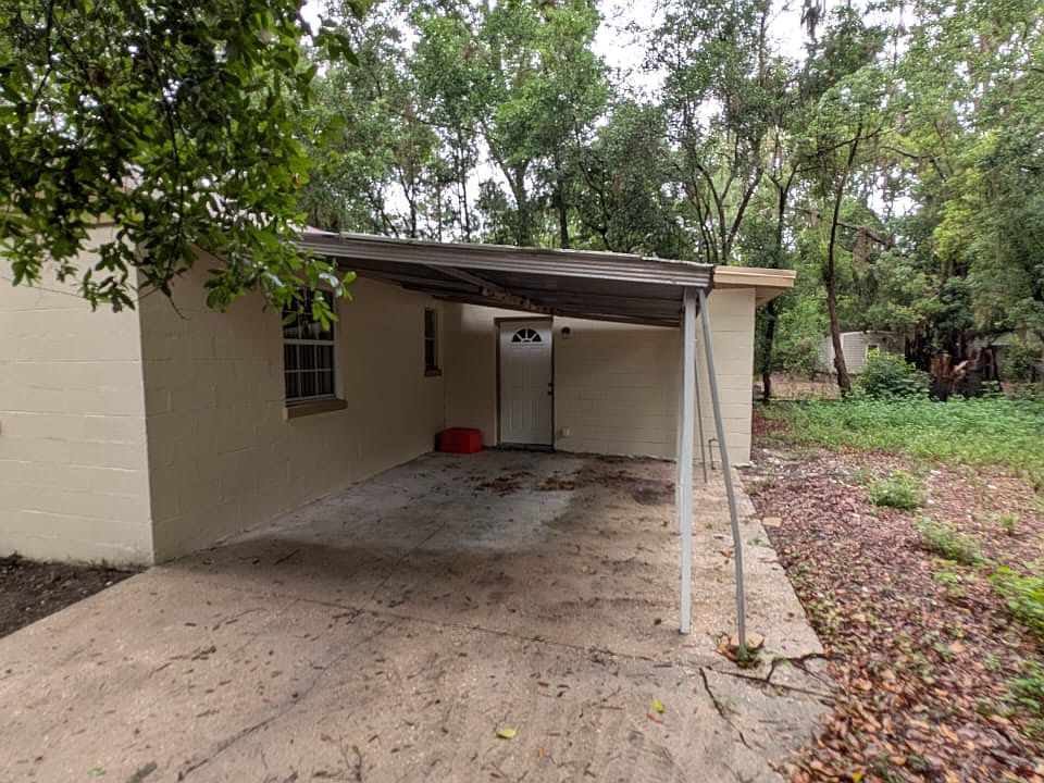 Roofed back porch