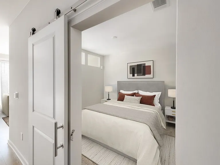 Studio bedroom with sliding barn door