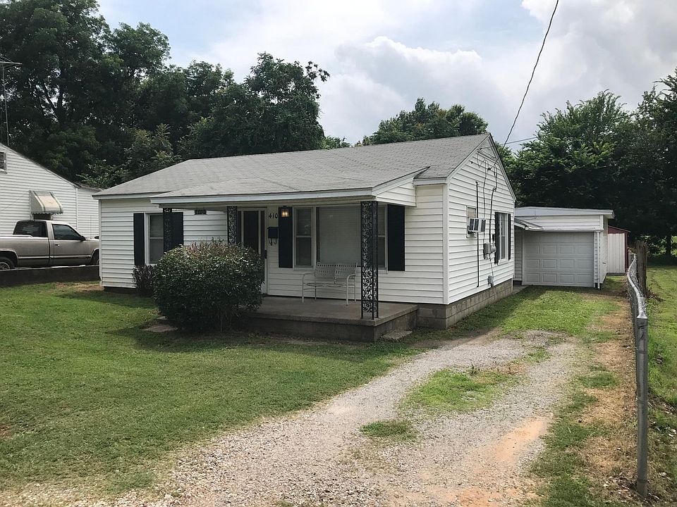 Front view with attached garage