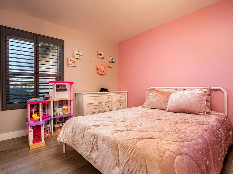 3rd bedroom with shutters.