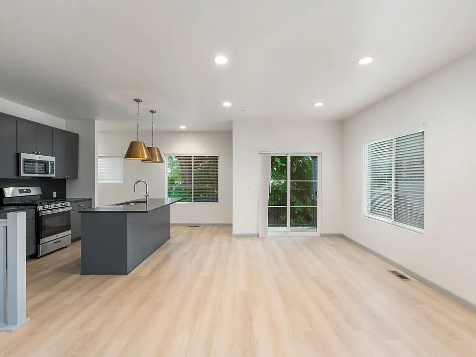 Quaker Condos - Look and Lease Same Day Special: $500 Off Move-In Costs for July!