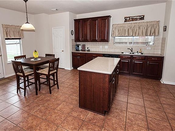 Beautiful Kitchen with 42" cabinetry, silestone countertops & ceramic tile