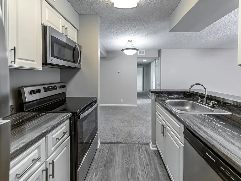 Abundant cabinetry, expansive counterspace, and seamless connections into dining and living areas redefine the art of culinary expression at The View.