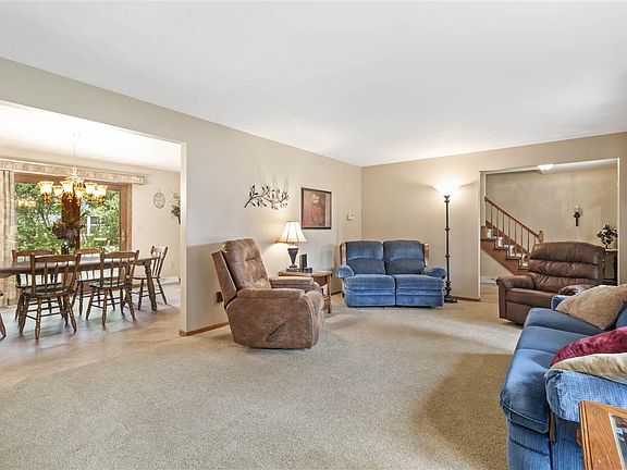 OPEN TO KITCHEN AND DINING ROOM