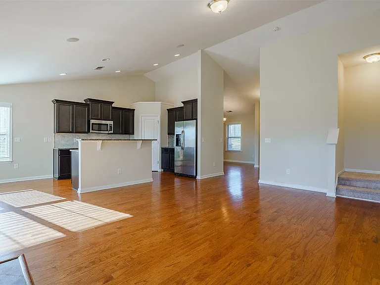 Gorgeous kitchen/family room with vaulted ceiling.