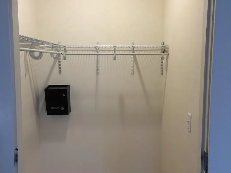 Large walk-in closet in bedroom