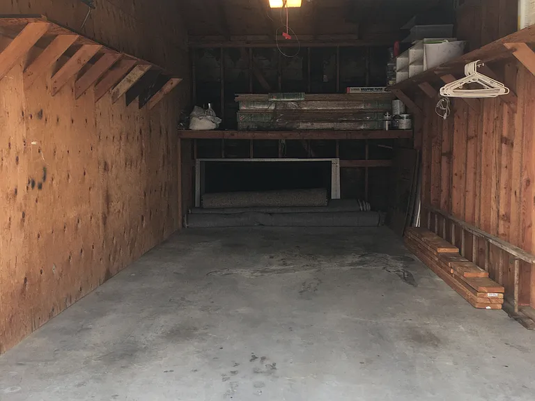 Very spacious garage with storage options