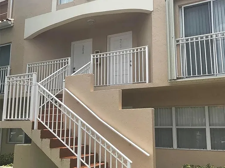 8670 NW 6th Ln #208 — Photo 1