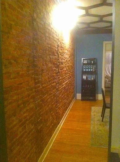 Exposed brick/ceiling
