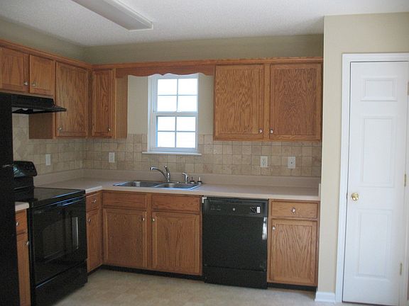 Nice size kitchen w. pantry and tumbled marble backsplash