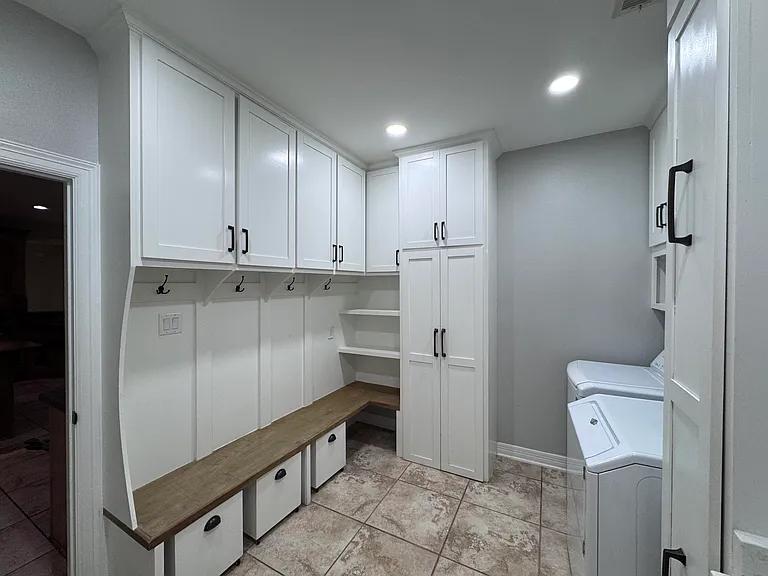Mudroom entry from garage with washer and dryer
