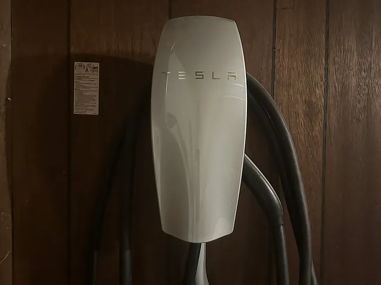 Tesla car charger in garage