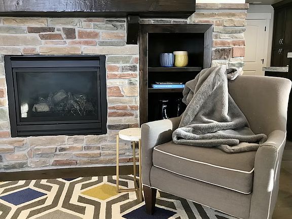 Built-ins surround the fireplace.